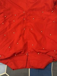 Elegant Red Kurta with Pearl Embellishments