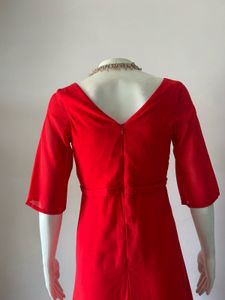 Elegant Red Gown with Embellished Neckline