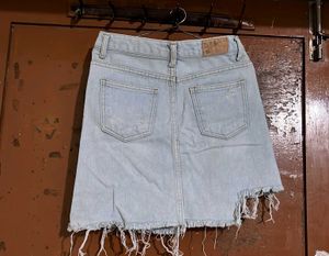 Light Wash Ripped Denim Skirt