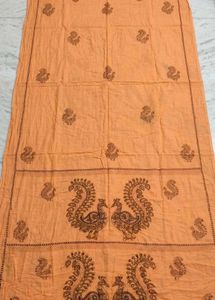 Orange Saree with Peacock Motifs