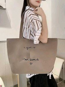 Stylish Black Tote Bag - "I got it mama"
