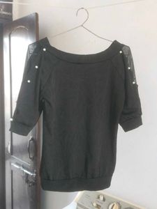Stylish Black Top with Pearl Detail
