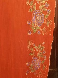 Elegant Red Saree with Floral Print