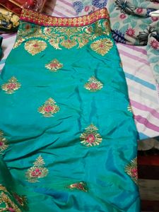 Teal Embroidered Silk Saree