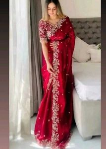 Stunning Red Embroidered Saree with stiched blouse
