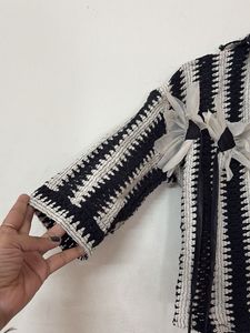 Striped Knit Top with Flower Detail