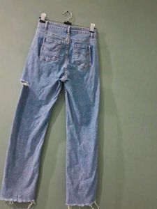 Distressed Blue Denim Jeans
