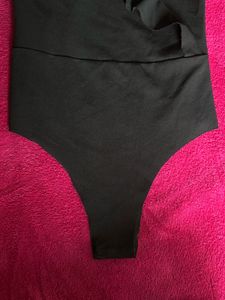 Black Ruffle Bodysuit