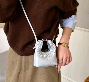 Chic Pastel Blue Ruffled Handbag