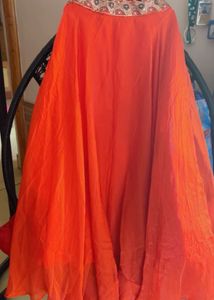 Flowing Orange Ethnic Skirt with choli and jacket