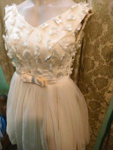 Elegant Cream Party Dress with Embellishments