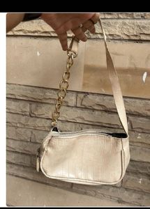 Beige baguette bag