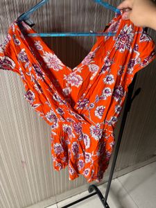 Chic Orange Floral Romper