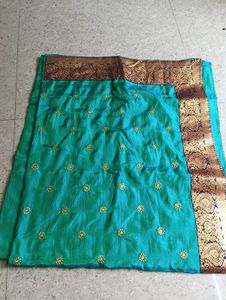 Elegant Teal Silk Saree with Gold Embroidery