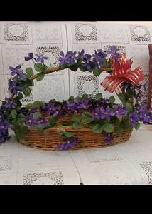 8. Wicker Basket with Purple Flowers