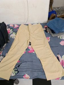 Beige colour trousers