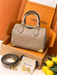 Louis Vuitton Speedy-style studded trunk handbag w