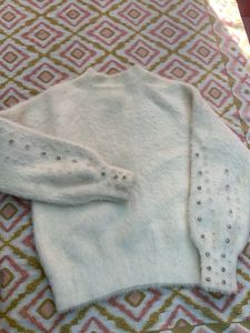 Cream fuzzy sweater with pearl details
