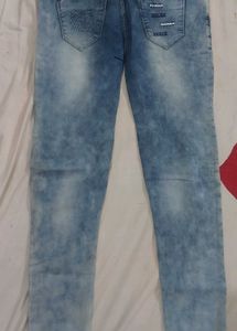 Distressed Light Wash Denim Jeans