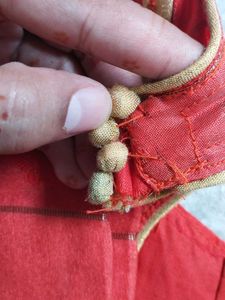 Elegant Beige Saree with Red Blouse Piece