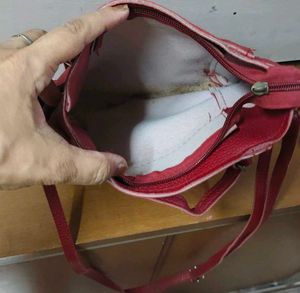 Red sling purse