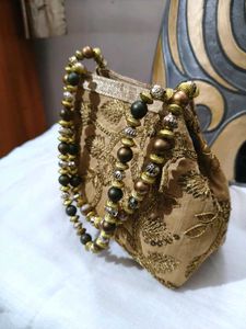 Embroidered Clutch with Beaded Handle