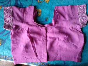 Georgette saree eith blouse..border and design...Pink in colour..