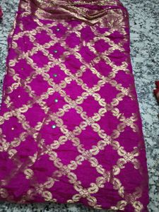 Vibrant Pink Saree with Golden Motifs