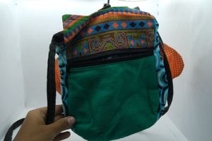 Colourful owl sling bag