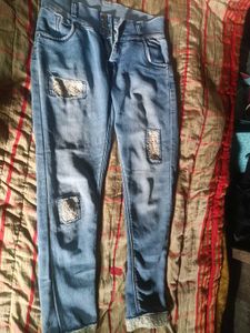 Distressed Denim Jeans