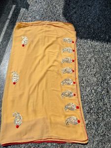 Elegant Yellow Saree with Embellishments