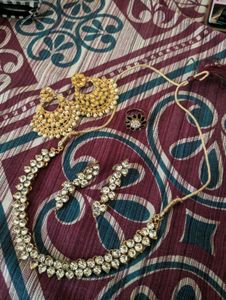 combo of 2 sets ,1 ring and a glass pendant