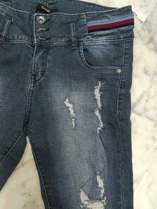 Distressed Denim Jeans.