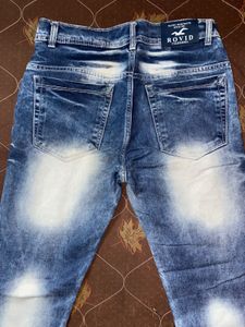 Distressed Denim Jeans