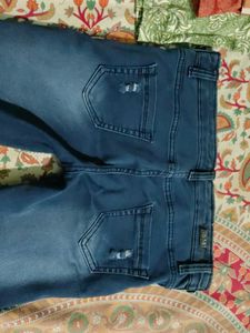 Blue Ripped Jeans with side button
