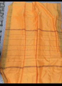 Vibrant Yellow Cotton Saree with Ornate Border