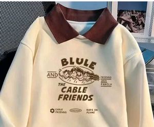 Cream Colored Graphic Sweatshirt