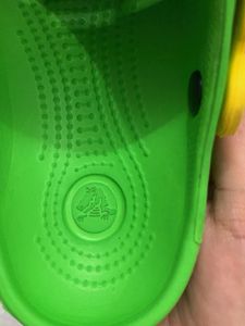 Green Crocs with Yellow Straps