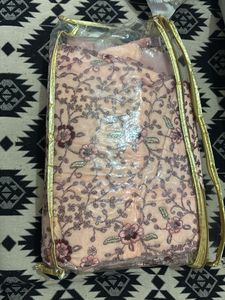 Unstitched Peach Embroidered Lehenga Choli