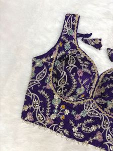 Designer Sleeveless Embroidered Blouse