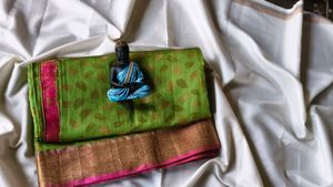 Vibrant Green Saree with Pink Border