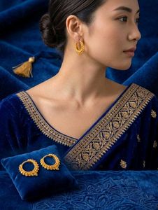 Gold Tone Ethnic Hoop Earrings