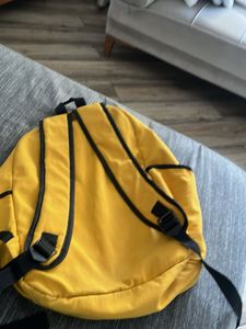 Yellow Backpack with "Escape plan" Text