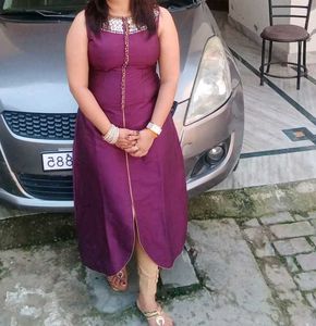 Elegant Purple Kurta Set with Embellished Neckline