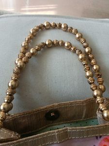Unique Beaded Handle Clutch Bag
