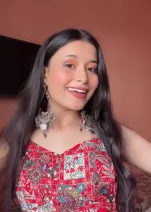Red Navratri blause with shells detailing