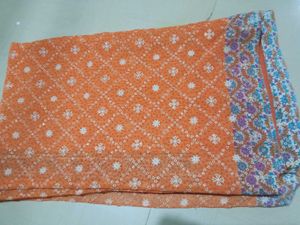 Orange Saree with White Motifs
