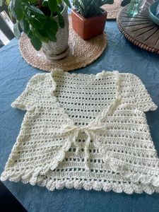 Crochet bolero with tie front