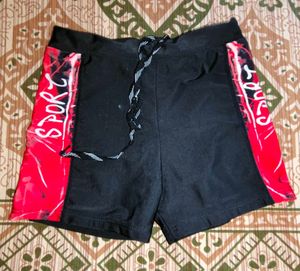 Blue Swim Bottoms with Orange Trim