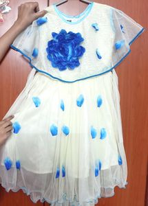 Off white and sky blue knee length frock for girls
